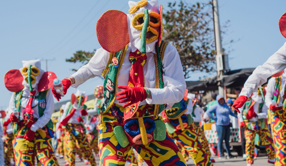 Colombians parade and dance during the 'Batalla de las Flores' parade in Barranquilla, Colombia during the Carnival of Barranquilla on february 18, 2023. (Photo by: Roxana Charris/Long Visual Press/Universal Images Group via Getty Images)