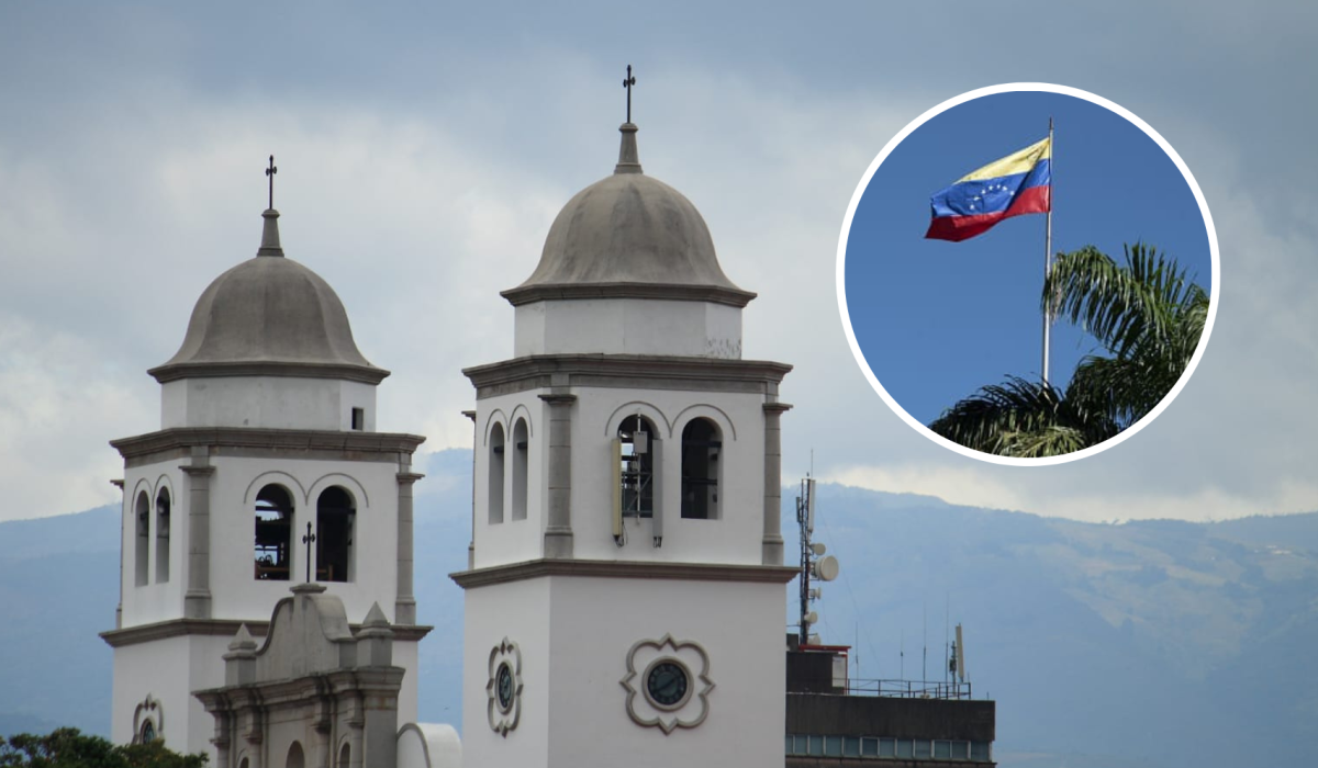 Iglesia de San Cristóbal de Táchira y una bandera de Venezuela de fondo (Foto vía Getty Images)